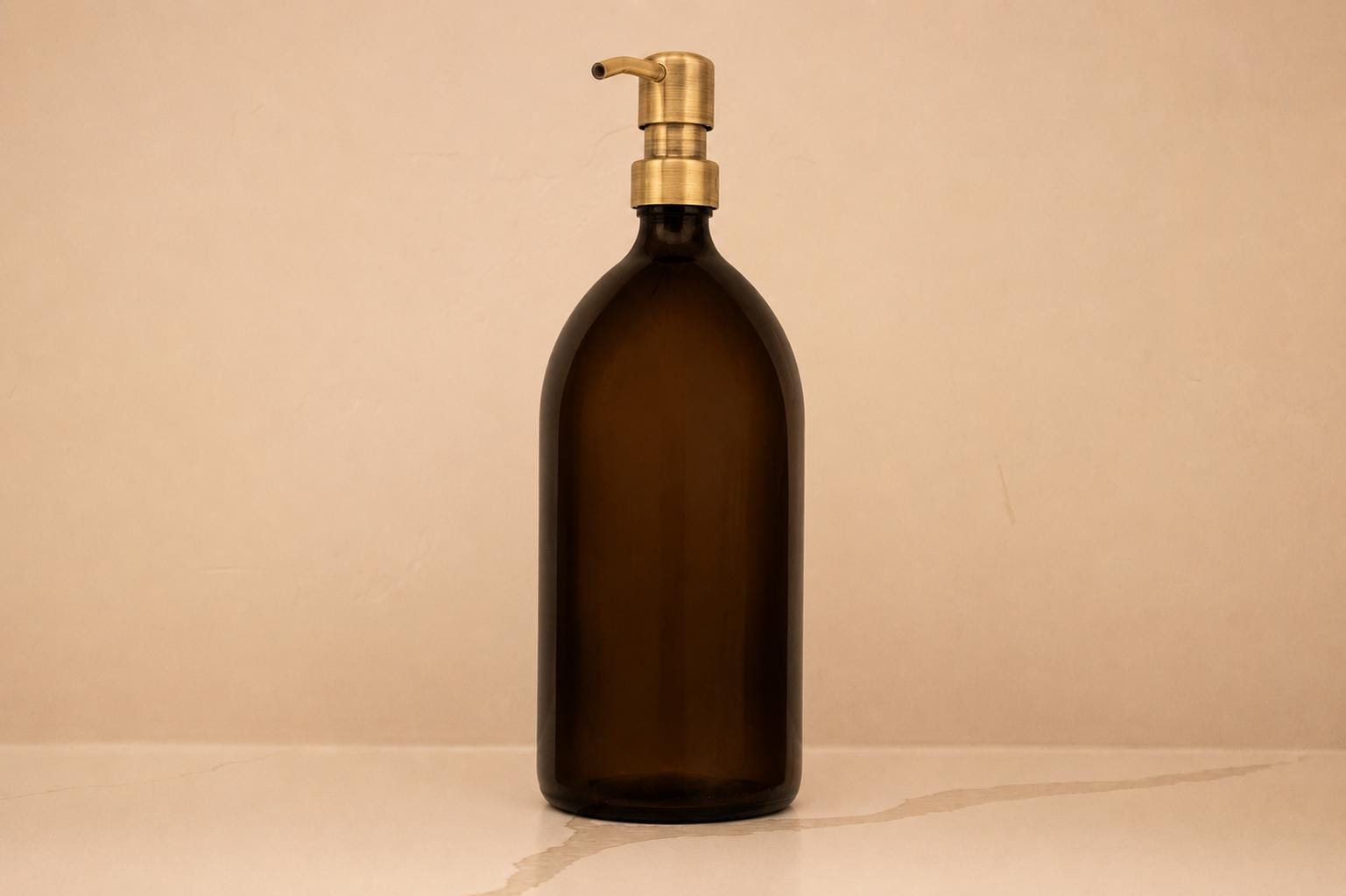 32 oz amber glass bottle with antique brass pump