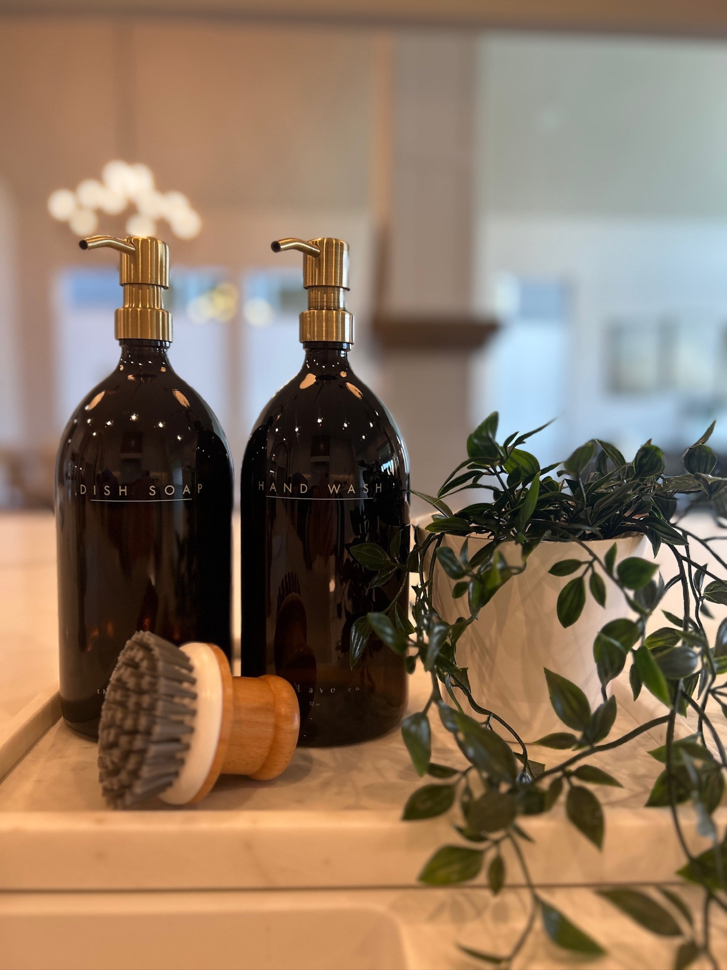 Lavé amber glass bottles in a luxury kitchen